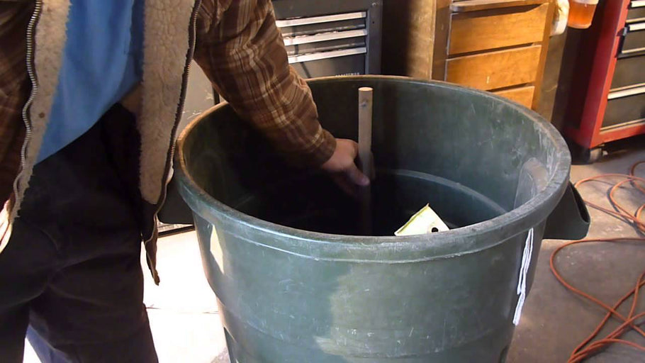 rolling garbage can and broom holder by Junk works DIY Garage (6 years ago)