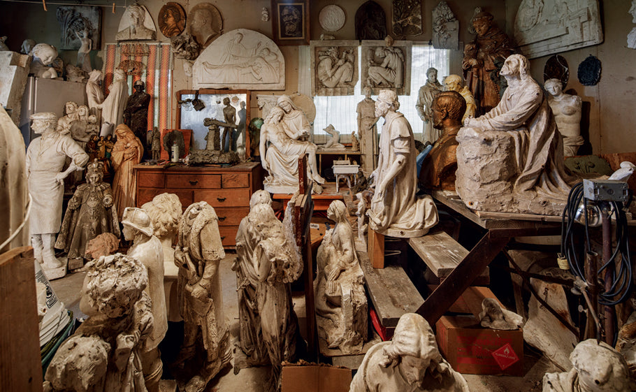 Plaster casts used as guides for final granite sculptures fill the Barre studio of master carver Giuliano Cecchinelli.